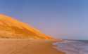 When Sahara dunes meet with the sea  