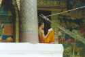 Monk reading in the pagoda.