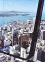 Auckland, New Zealand s largest city, sits at the edge of th