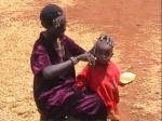 Mother cutting your child 's hair , Marsabit