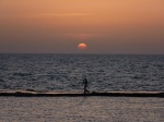 Fisherman at sunset in Akko