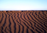 arena contra piedra
duna muro arena M'hamid Marruecos